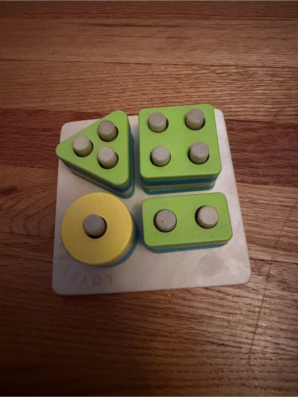 Lovevery Wooden Shape Stacking Puzzle - Blue, Yellow, Green and Teal